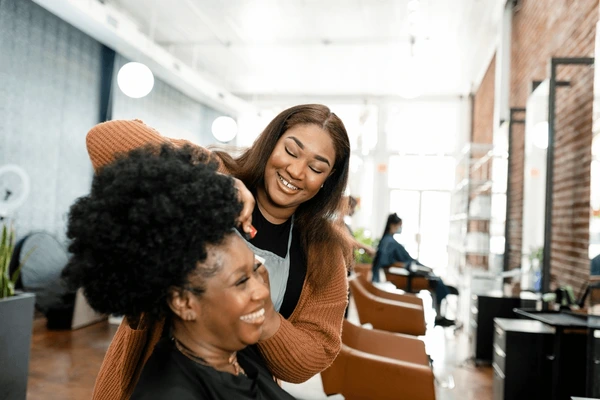 Hairdresser styling hair